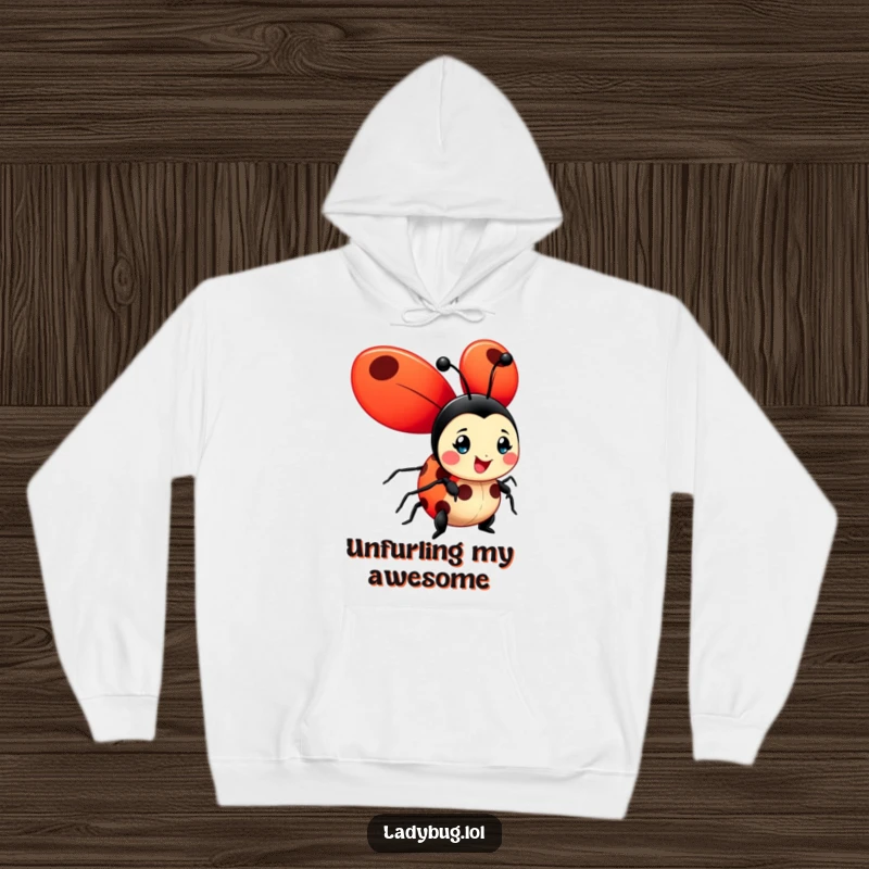 Funny ladybug hoodie showing a happy character with big, bright red wings unfurled, perfect for cozy, cheerful wear.
