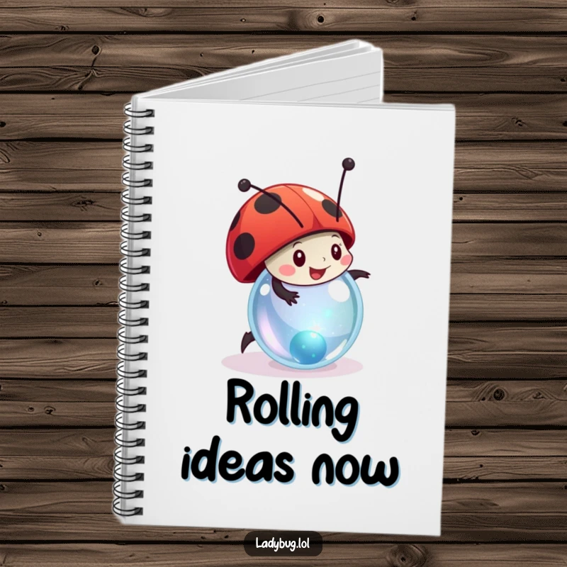 Funny ladybug notebook with a character joyfully rolling a tiny, sparkling marble, perfect for writing and creativity.