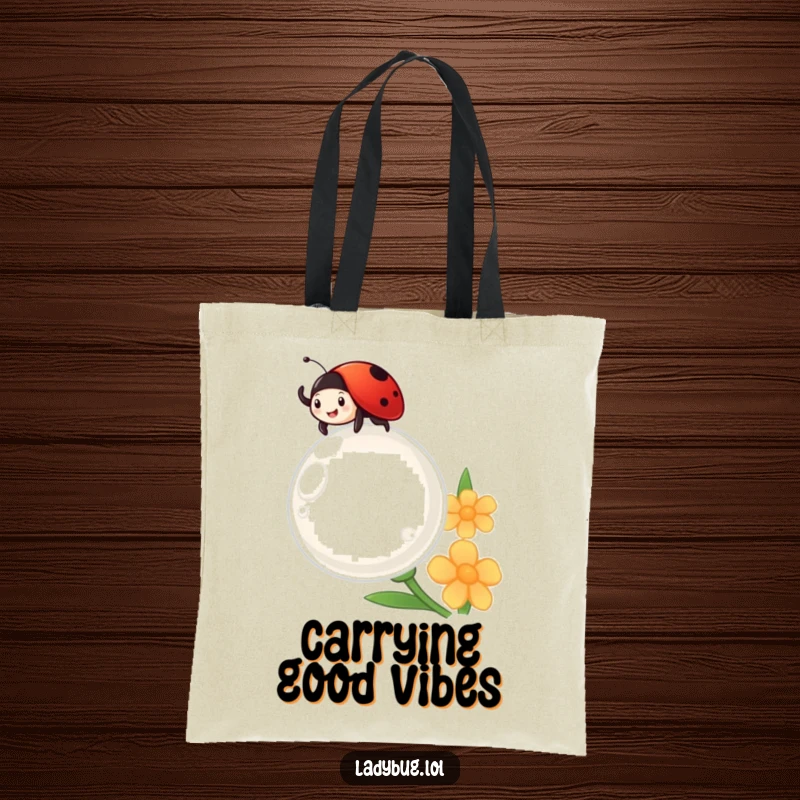 Funny ladybug cheerfully waves from atop a giant dewdrop, looking delighted, on a versatile tote bag.