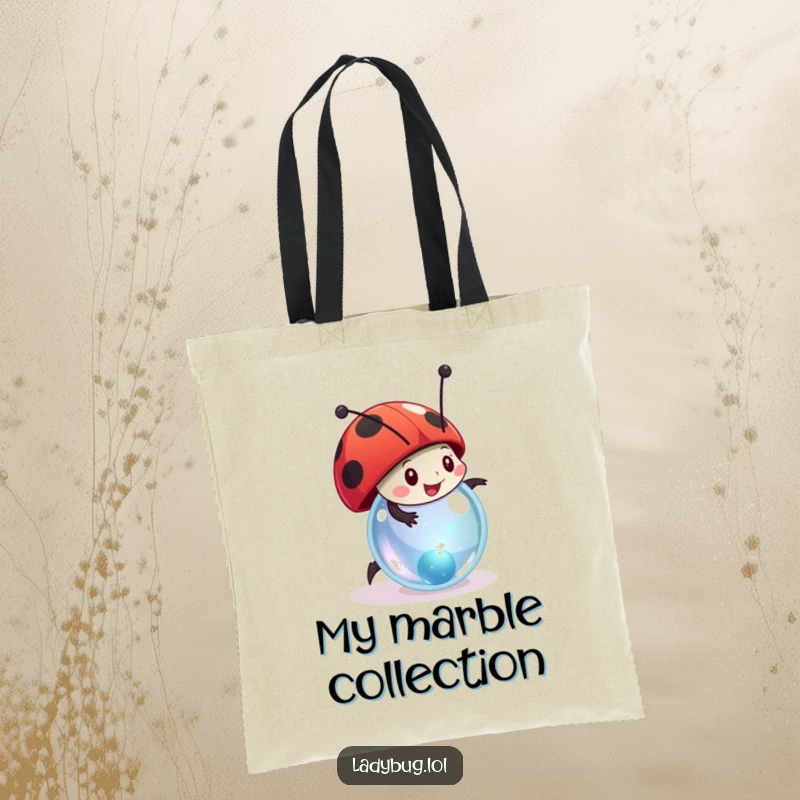 Funny ladybug tote bag showing a stylized character joyfully rolling a small, sparkling marble, great for carrying fun.